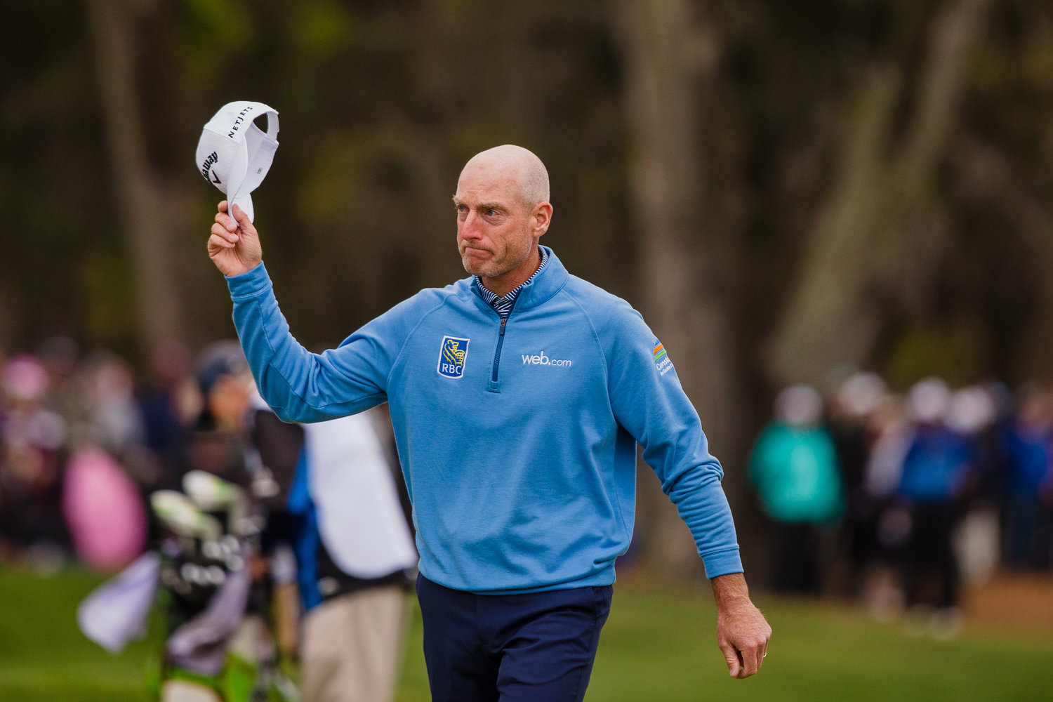 An emotional Jim Furyk tips his hat to fans as he closes out his final round at THE PLAYERS on Sunday. He finished runner-up to Rory McIlroy.